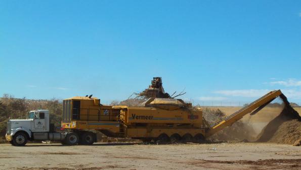 Storm-struck city relies on tub grinders to aid cleanup efforts (with related video)