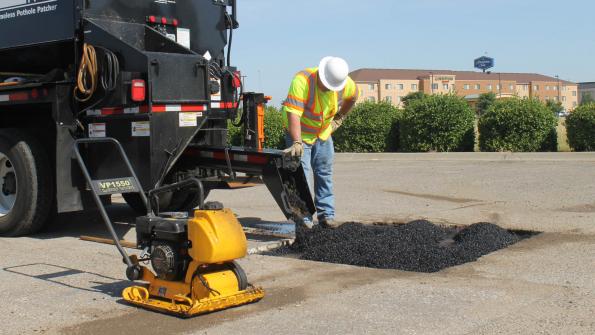 New York community combats potholes with patcher