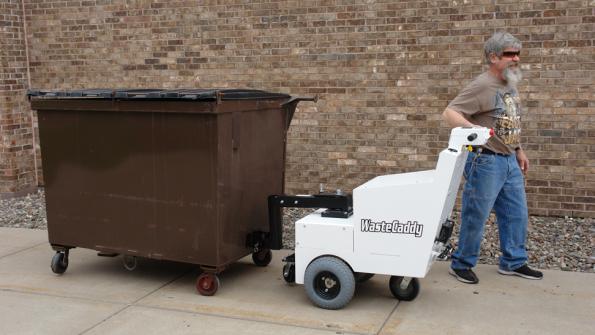 Tow device helps safely move dumpsters