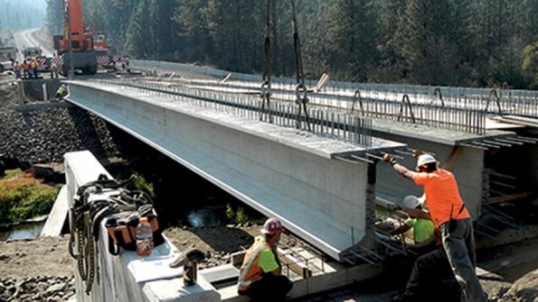 Concrete girders — sturdy and lengthy — used in Washington state bridge replacement