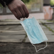 woman carying surgical mask